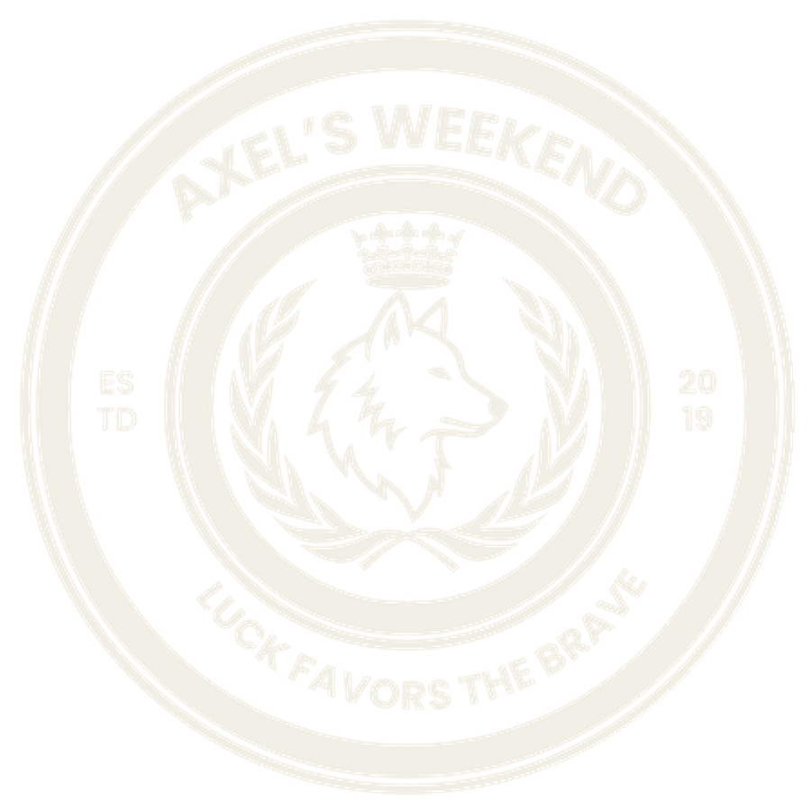 Axel's Weekend crest: a crowned dog framed by laurels, Luck Favors the Brave, established 2019
